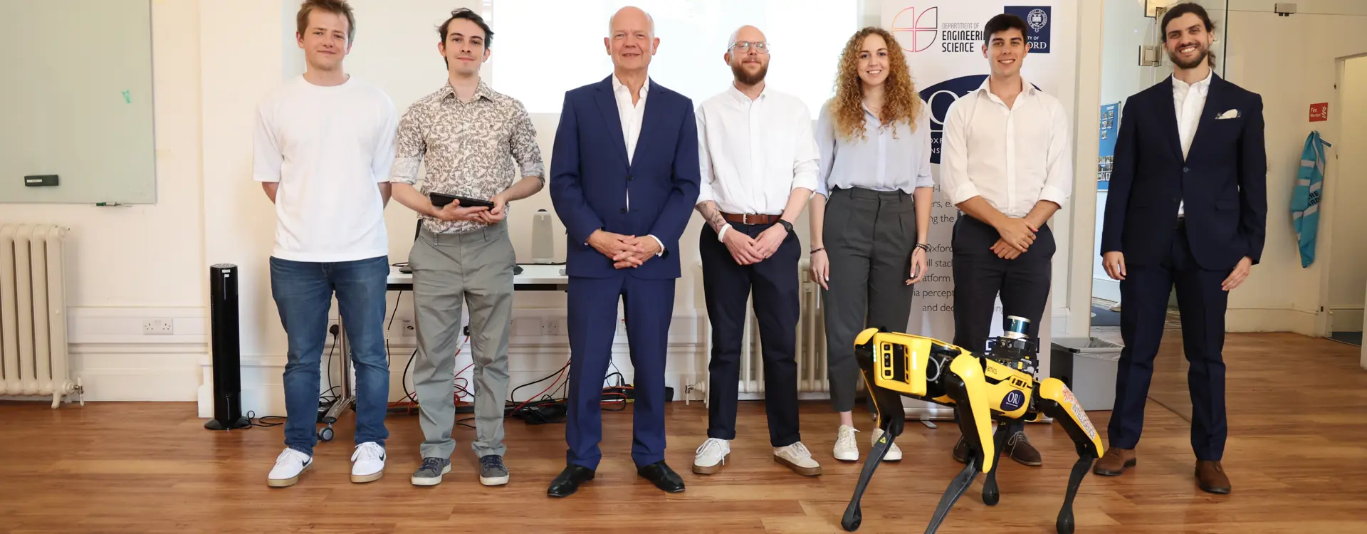 Boston Dynamics Spot pictured with Lord Hague, Prof. Nick Hawes, Daniele De Martini, Luke Robinson, Matthew Budd, Efimia Panagiotaki, Michael Groom