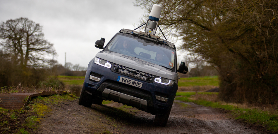 JLR Range Rover driving offroad for data collection trial. 