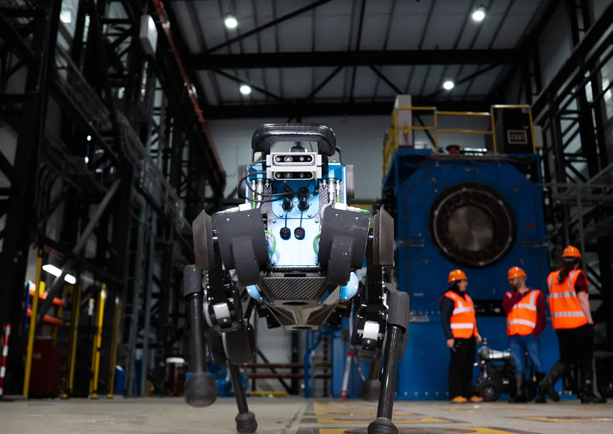 blue ANYmal B robot, standing in industrial site.